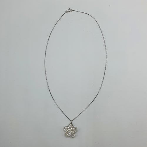 Girocollo in argento 925 con ciondolo a forma di fiore in plexiglass e strass Swarovski.