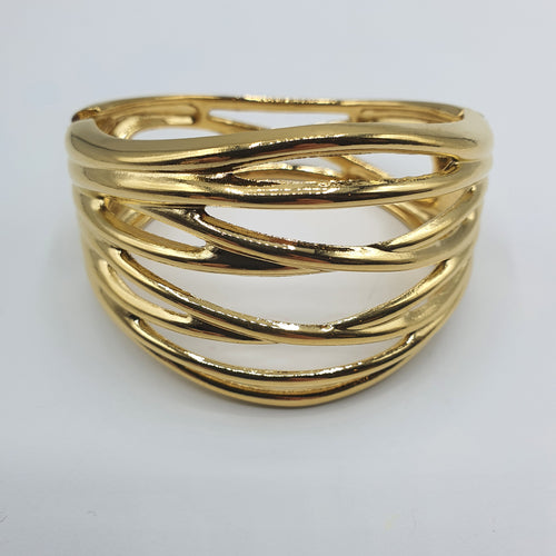 Bracciale rigido, modello manetta acciaio placcato oro.