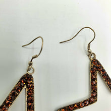 Carica l&#39;immagine nel visualizzatore di Gallery, Coppia orecchini anallergici con stella traforata in strass marroni.