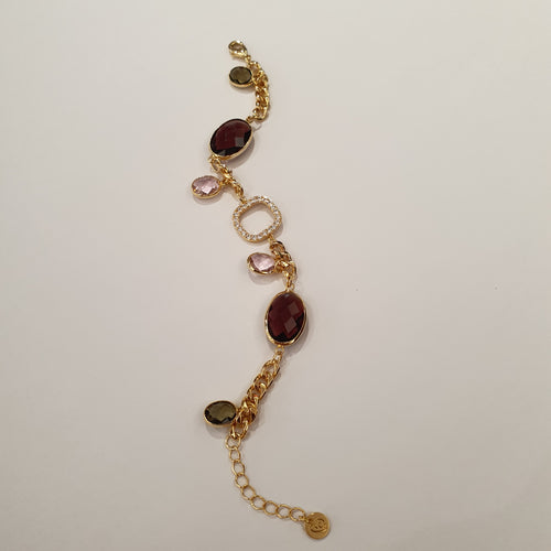 Bracciale placcato oro maglia groumette e pietre color prugna, rosa e verdi, con strass