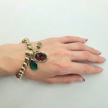 Carica l&#39;immagine nel visualizzatore di Gallery, Bracciale con boule in metallo placcato oro con charms.